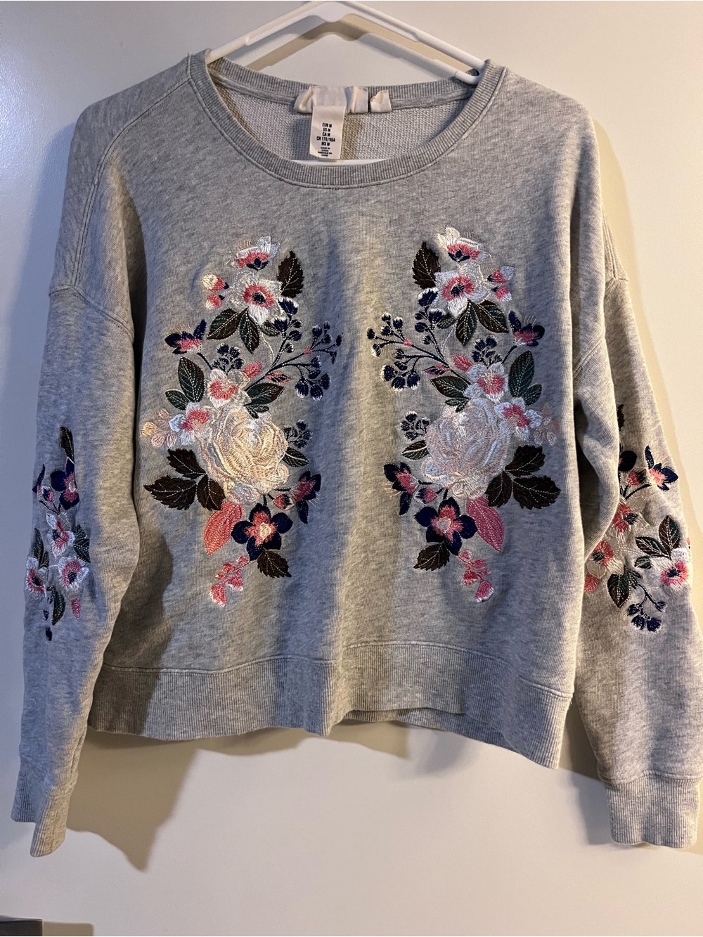 Floral embroidered (on front and both sleeves) crew neck sweatshirt - size M